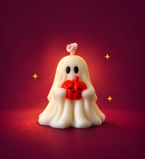 Vela Fantasma Halloween Moravi en cera marfil con mini calabaza roja