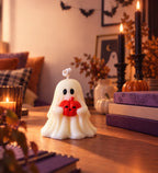 Vela Fantasma Halloween Moravi decorando una mesa cálida con ambiente otoñal